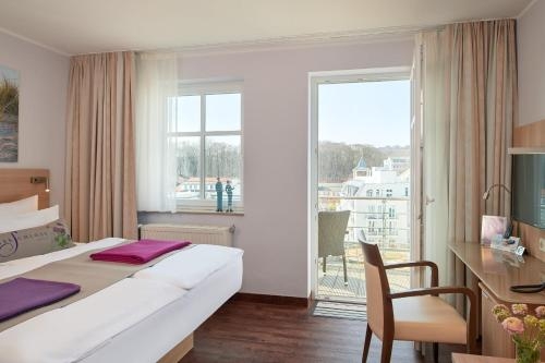 Imagen de la habitación del Hotel Seeschloss Sellin. Foto 7