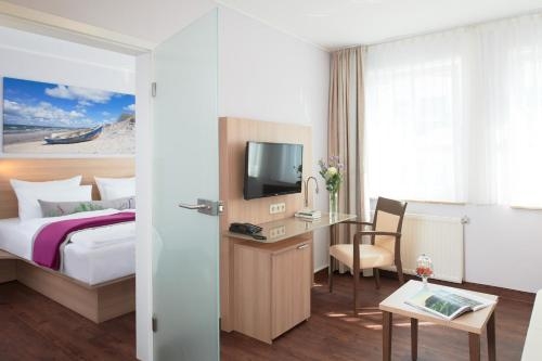 Imagen de la habitación del Hotel Seeschloss Sellin. Foto 10