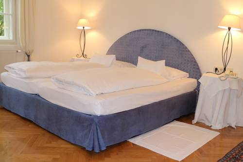 Imagen de la habitación del Hotel Seeschl&ouml;&szlig;l Velden. Foto 11