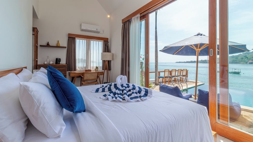 Imagen de la habitación del Hotel Segara Seaside Resort. Foto 4