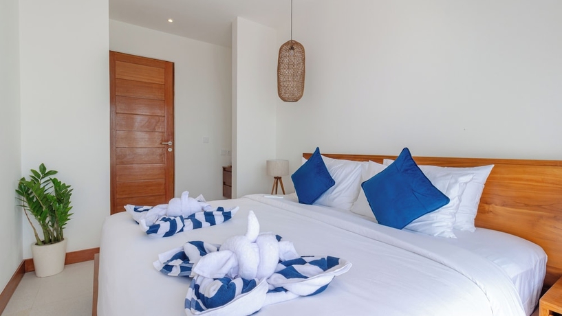 Imagen de la habitación del Hotel Segara Seaside Resort. Foto 8