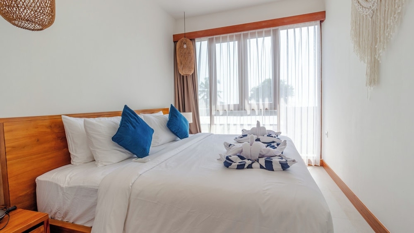 Imagen de la habitación del Hotel Segara Seaside Resort. Foto 11