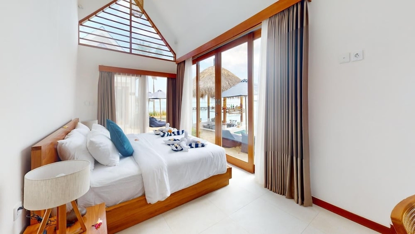 Imagen de la habitación del Hotel Segara Seaside Resort. Foto 14
