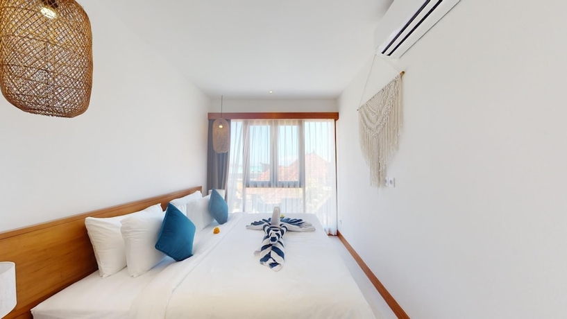 Imagen de la habitación del Hotel Segara Seaside Resort. Foto 16