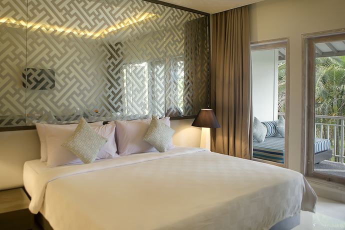 Imagen de la habitación del Hotel Segara Village. Foto 9