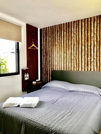 Imagen de la habitación del Hotel Segara Villas. Foto 2