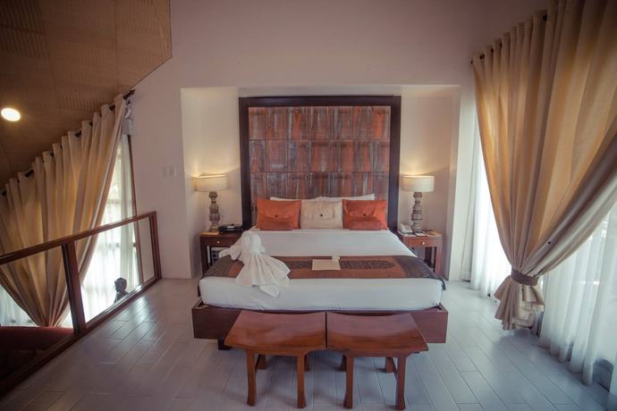 Imagen de la habitación del Hotel Segara Villas. Foto 4
