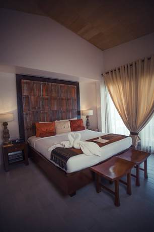 Imagen de la habitación del Hotel Segara Villas. Foto 13