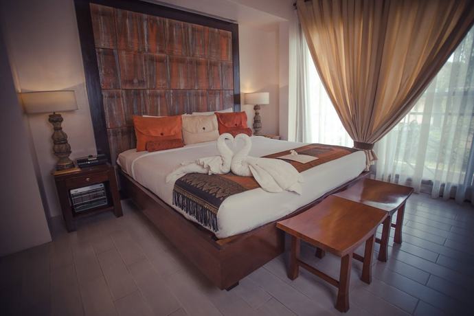 Imagen de la habitación del Hotel Segara Villas. Foto 14