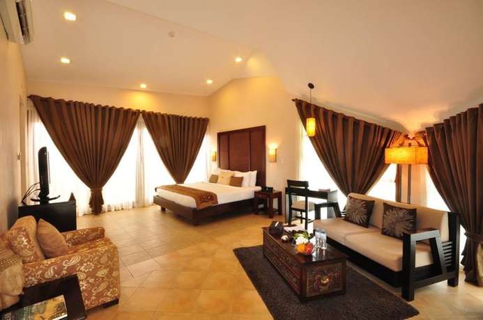 Imagen de la habitación del Hotel Segara Villas. Foto 17
