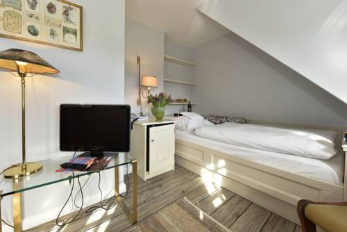 Imagen de la habitación del Hotel Seiler Hof Keitum Garni. Foto 11