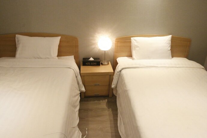 Imagen de la habitación del Hotel Sejong, Jeju. Foto 17