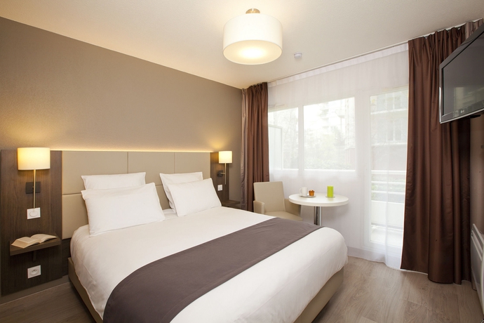 Imagen de la habitación del Hotel Sejours Et Affaires Courbevoie Grande Arche. Foto 11