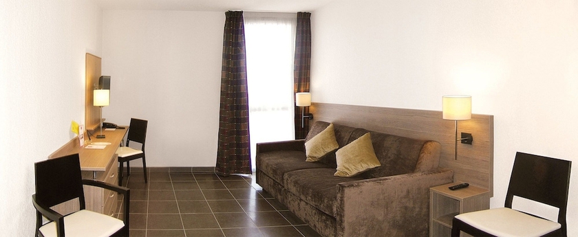 Imagen de la habitación del Hotel Sejours and Affaires Manosque Moulin Neuf. Foto 8