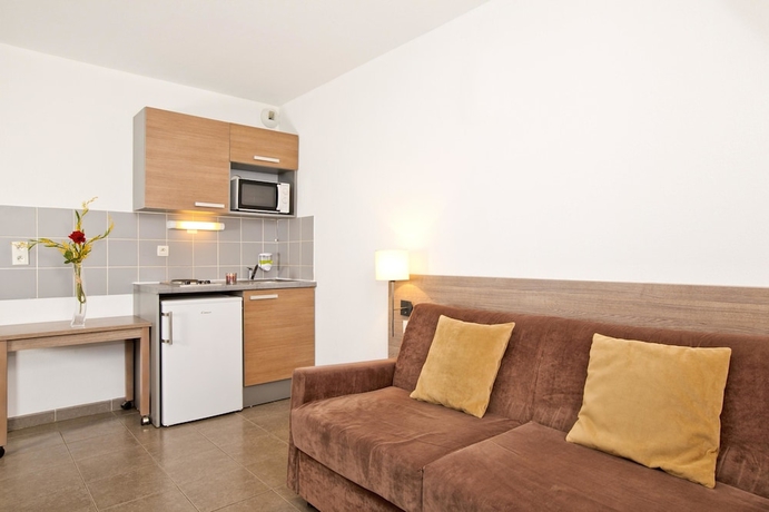 Imagen de la habitación del Hotel Sejours and Affaires Manosque Moulin Neuf. Foto 11