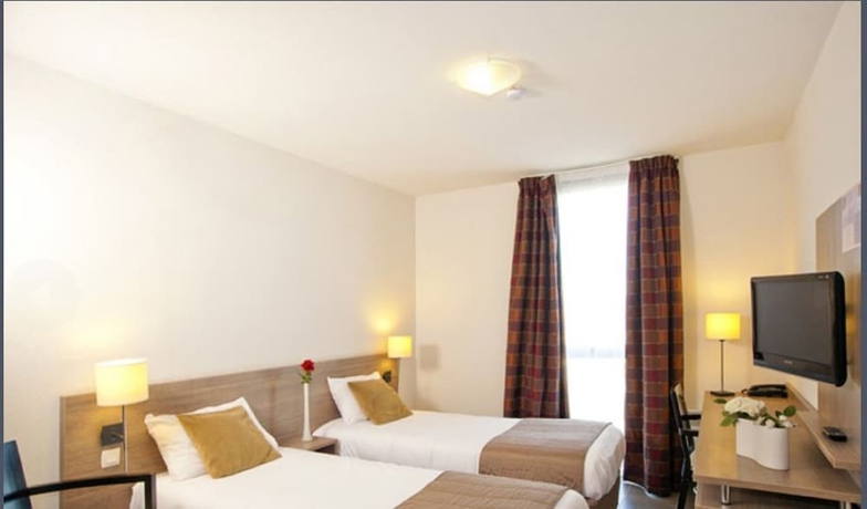 Imagen de la habitación del Hotel Sejours and Affaires Manosque Moulin Neuf. Foto 14