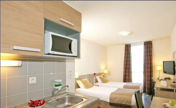 Imagen de la habitación del Hotel Sejours and Affaires Manosque Moulin Neuf. Foto 15