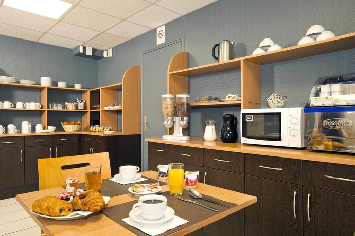 Imagen del bar/restaurante del Hotel Sejours and Affaires Nantes Ducs De Bretagne. Foto 4