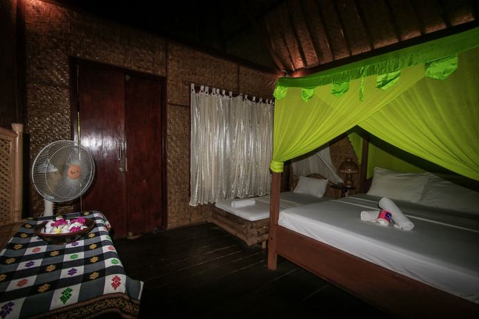 Imagen de la habitación del Hotel Sejuk Cottages. Foto 12