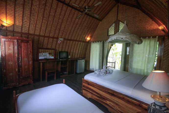 Imagen de la habitación del Hotel Sejuk Cottages. Foto 15