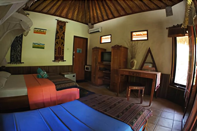 Imagen de la habitación del Hotel Sejuk Cottages. Foto 17