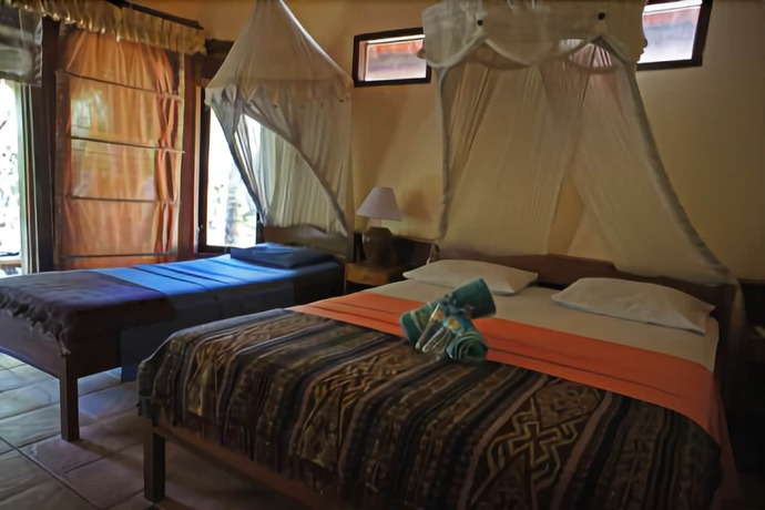 Imagen de la habitación del Hotel Sejuk Cottages. Foto 18