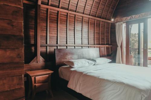Imagen de la habitación del Hotel Sekar Arum Riverside Resort in Canggu. Foto 18