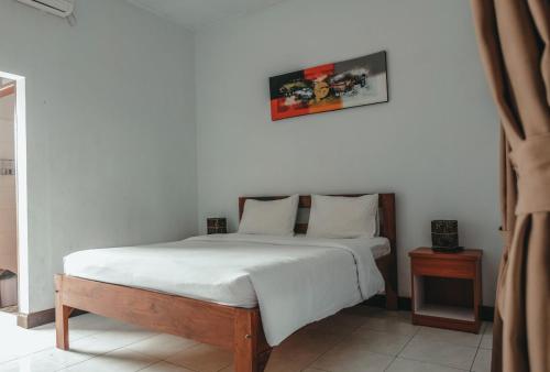 Imagen de la habitación del Hotel Sekar Arum Riverside Resort in Canggu. Foto 19