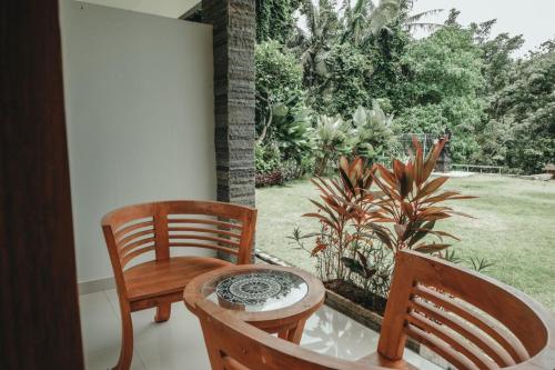 Imagen de la habitación del Hotel Sekar Arum Riverside Resort in Canggu. Foto 20