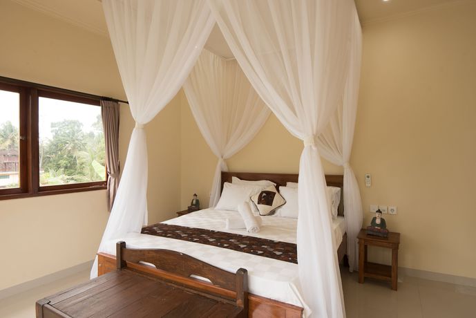 Imagen de la habitación del Hotel Sekembang Ubud Villa. Foto 9