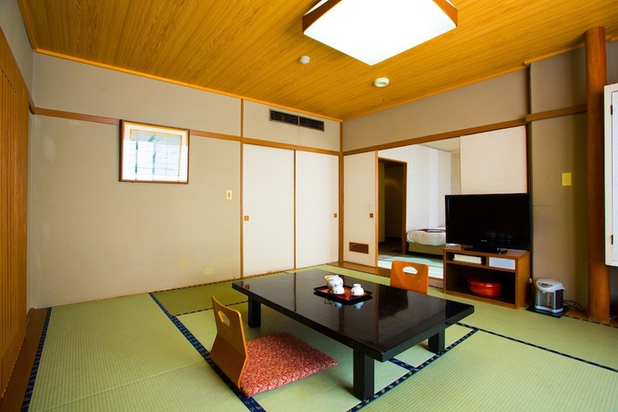 Imagen de la habitación del Hotel Sekitei, Fuefuki. Foto 6