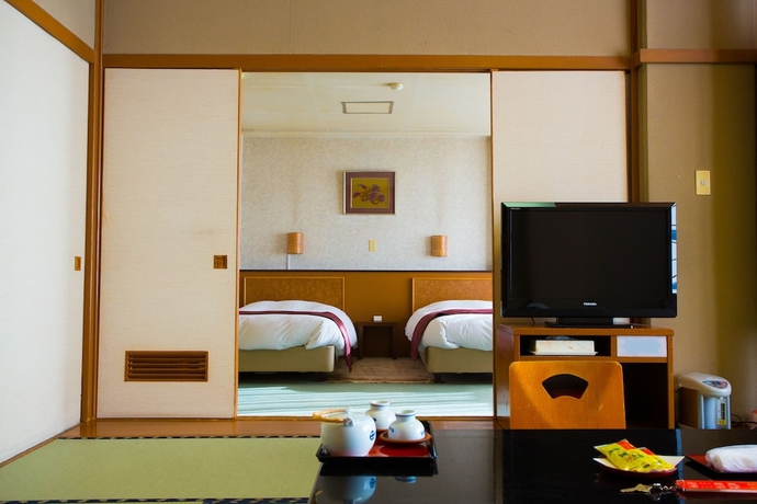 Imagen de la habitación del Hotel Sekitei, Fuefuki. Foto 12