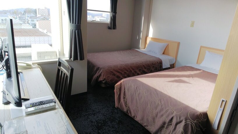 Imagen de la habitación del Hotel Select Inn Sano Ekimae. Foto 31
