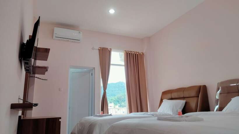 Imagen de la habitación del Hotel Selecta Indah. Foto 15