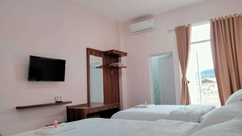 Imagen de la habitación del Hotel Selecta Indah. Foto 17
