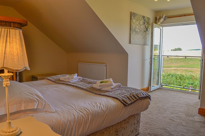 Imagen de la habitación del Hotel Self Catering at The Fairways. Foto 19