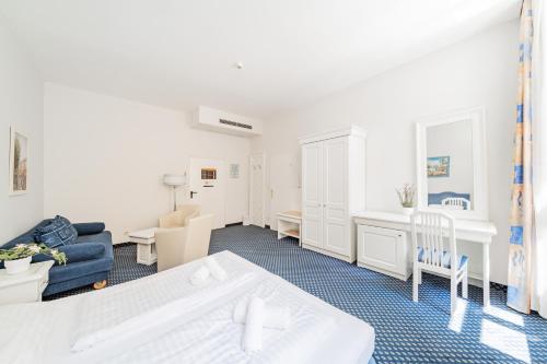 Imagen de la habitación del Hotel Self-Check-In Adlon. Foto 15