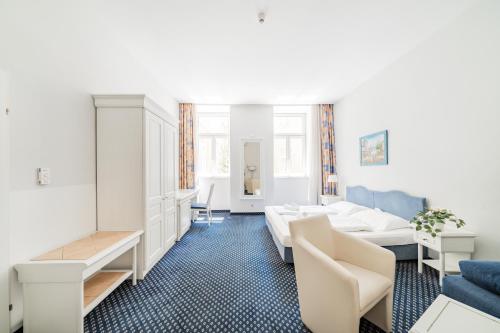 Imagen de la habitación del Hotel Self-Check-In Adlon. Foto 17