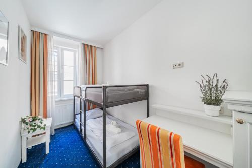 Imagen de la habitación del Hotel Self-Check-In Adlon. Foto 18