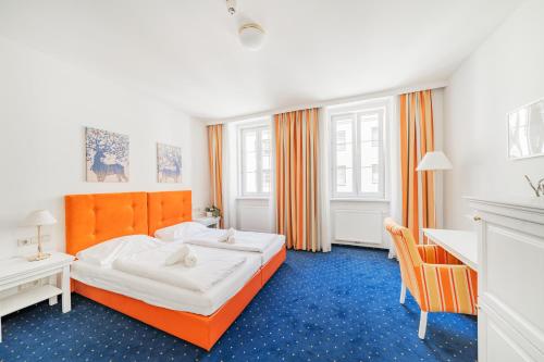 Imagen de la habitación del Hotel Self-Check-In Adlon. Foto 19