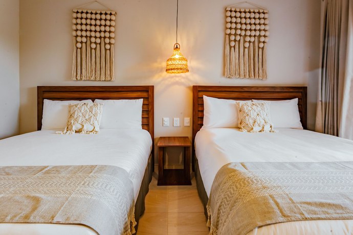 Imagen de la habitación del Hotel Selina Tulum Downtown. Foto 5