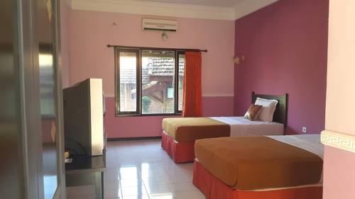 Imagen de la habitación del Hotel Selopanggung Kediri. Foto 1