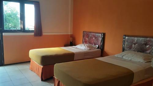 Imagen de la habitación del Hotel Selopanggung Kediri. Foto 2