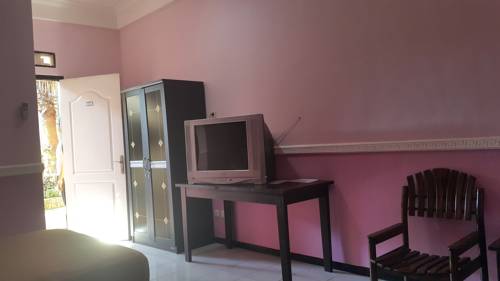 Imagen de la habitación del Hotel Selopanggung Kediri. Foto 3