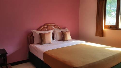 Imagen de la habitación del Hotel Selopanggung Kediri. Foto 4