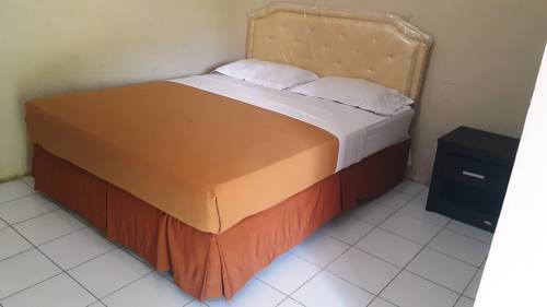 Imagen de la habitación del Hotel Selopanggung Kediri. Foto 5