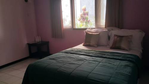 Imagen de la habitación del Hotel Selopanggung Kediri. Foto 6