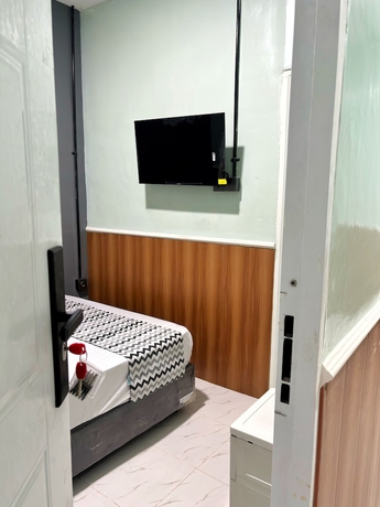 Imagen de la habitación del Hotel Semarang Co Stay. Foto 2