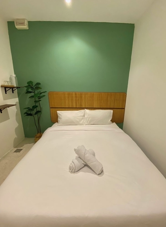 Imagen de la habitación del Hotel Sembilan Inn by Soft loft. Foto 11