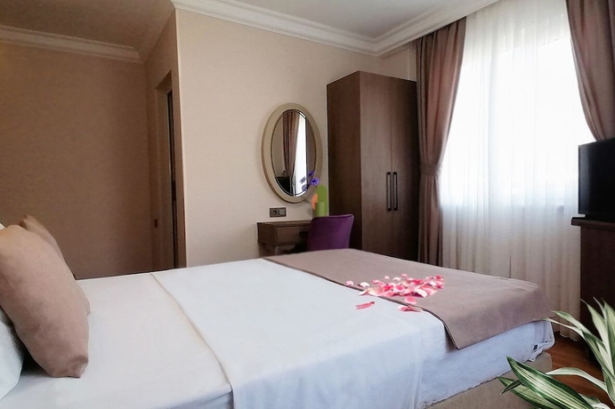 Imagen de la habitación del Hotel Sembol. Foto 15